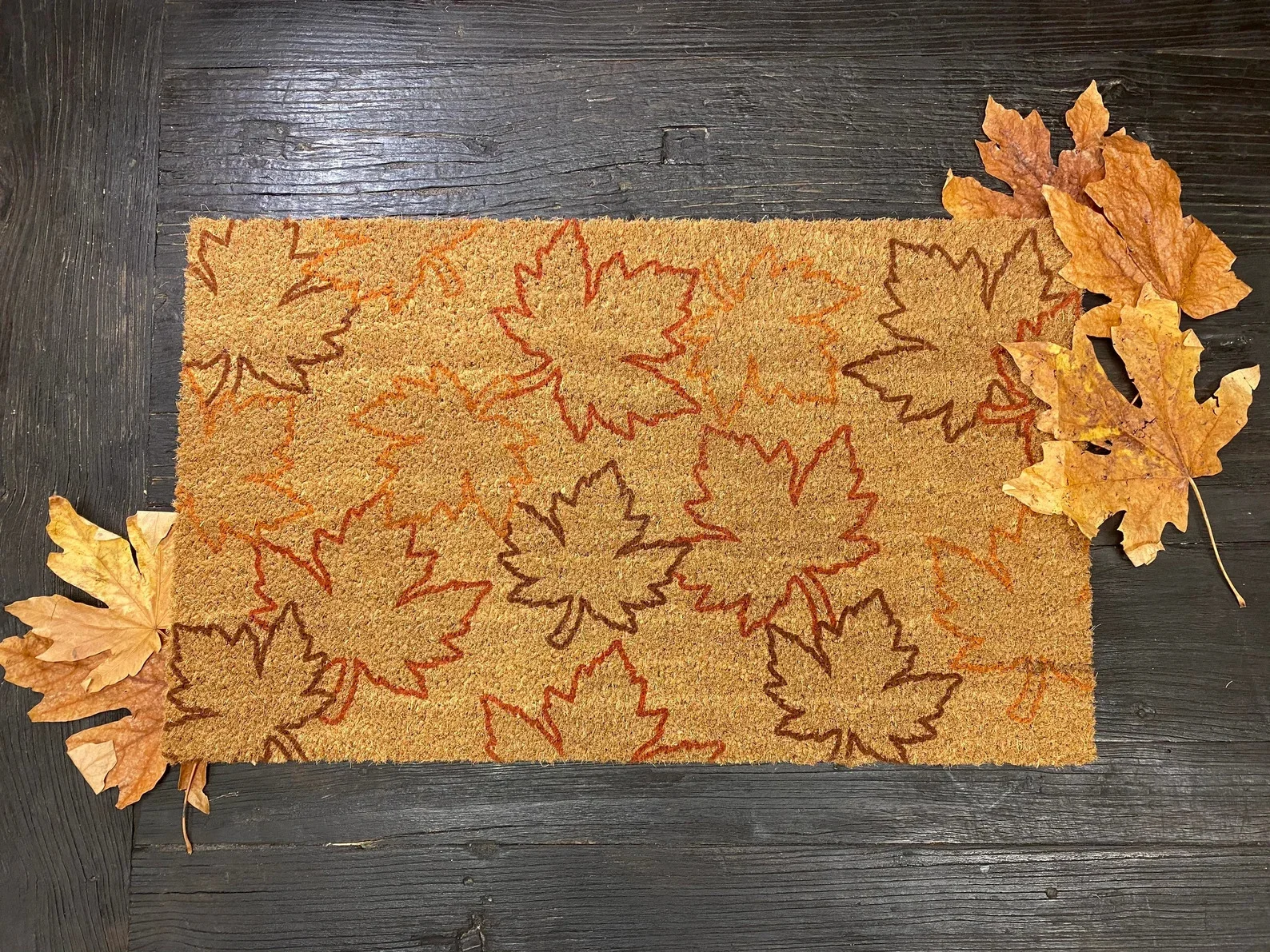 12. Alfombra con decoración otoñal Maple Leaf