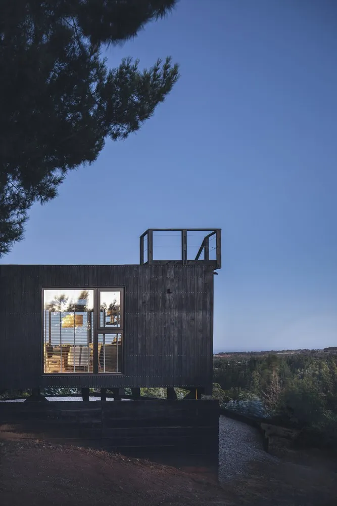 Дім Пуертекілло від Estudio Base Arquitectos у Навідаде, Чилі