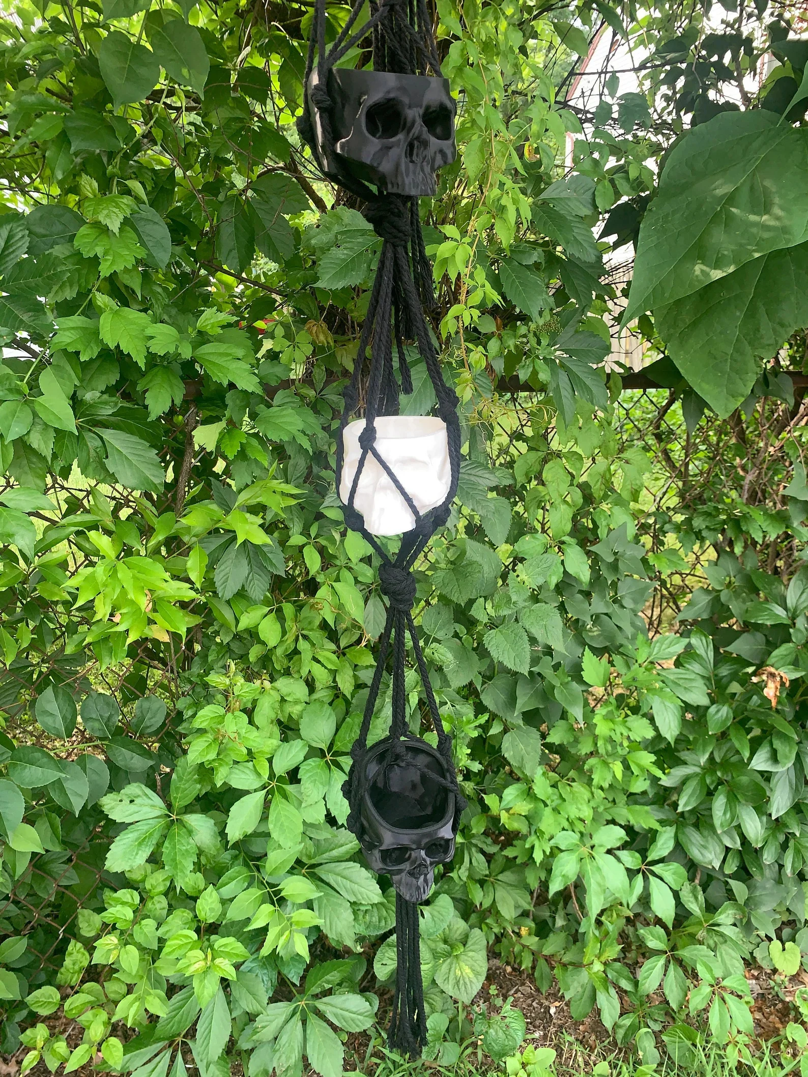 9. Skeleton Head Macrame Plant Hanger Inside and Out