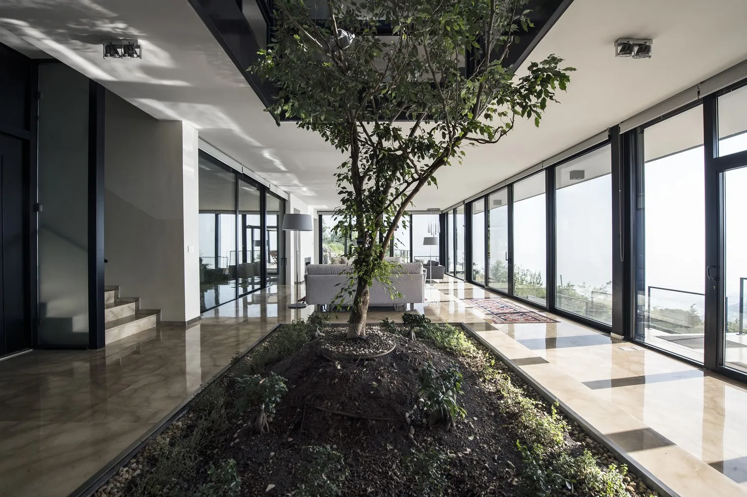 House Tahan by Blankpage Architects: Floating Stone Garden Over Junayd Bay