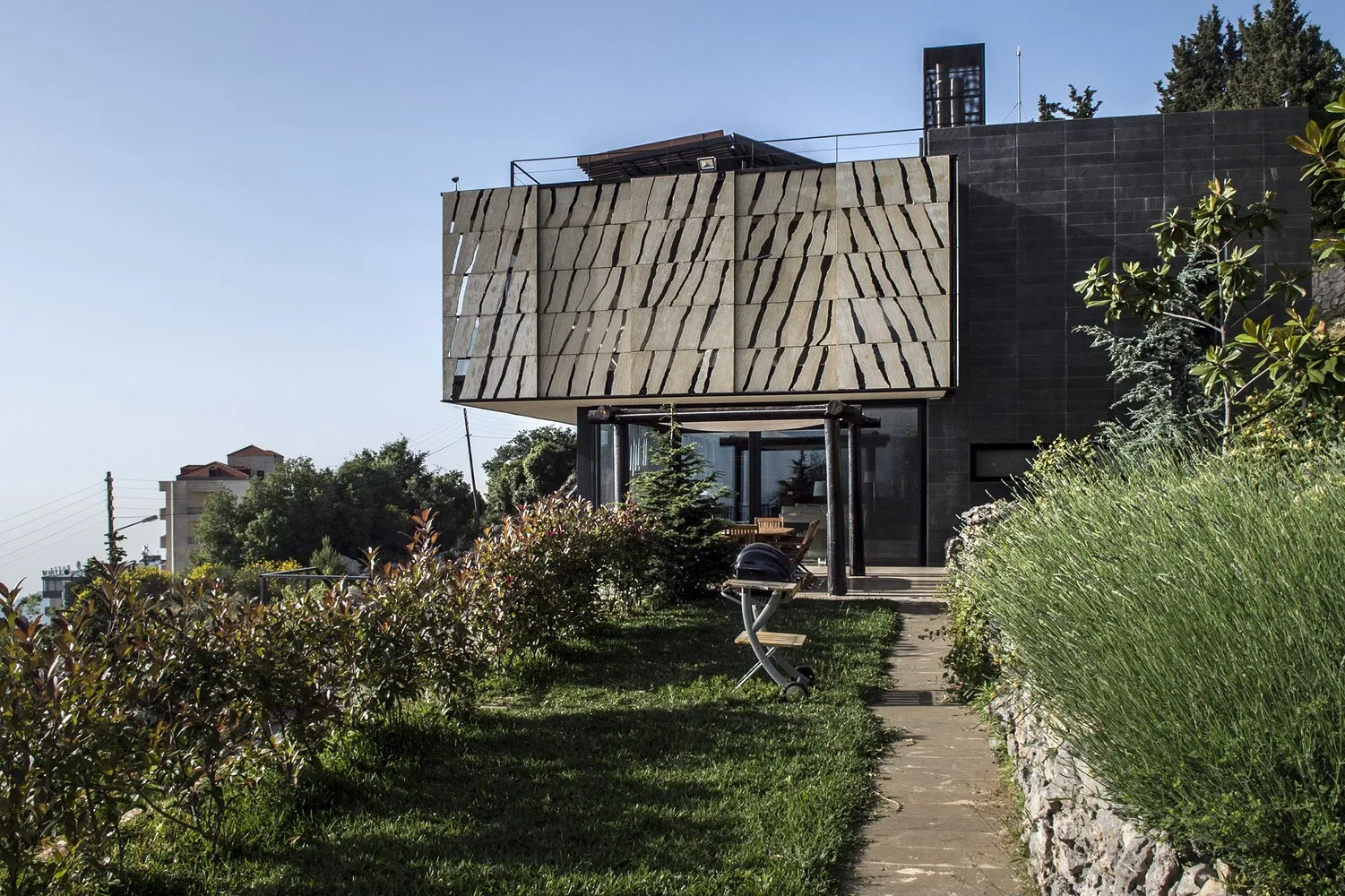 House Tahan by Blankpage Architects: Floating Stone Garden Over Junayd Bay