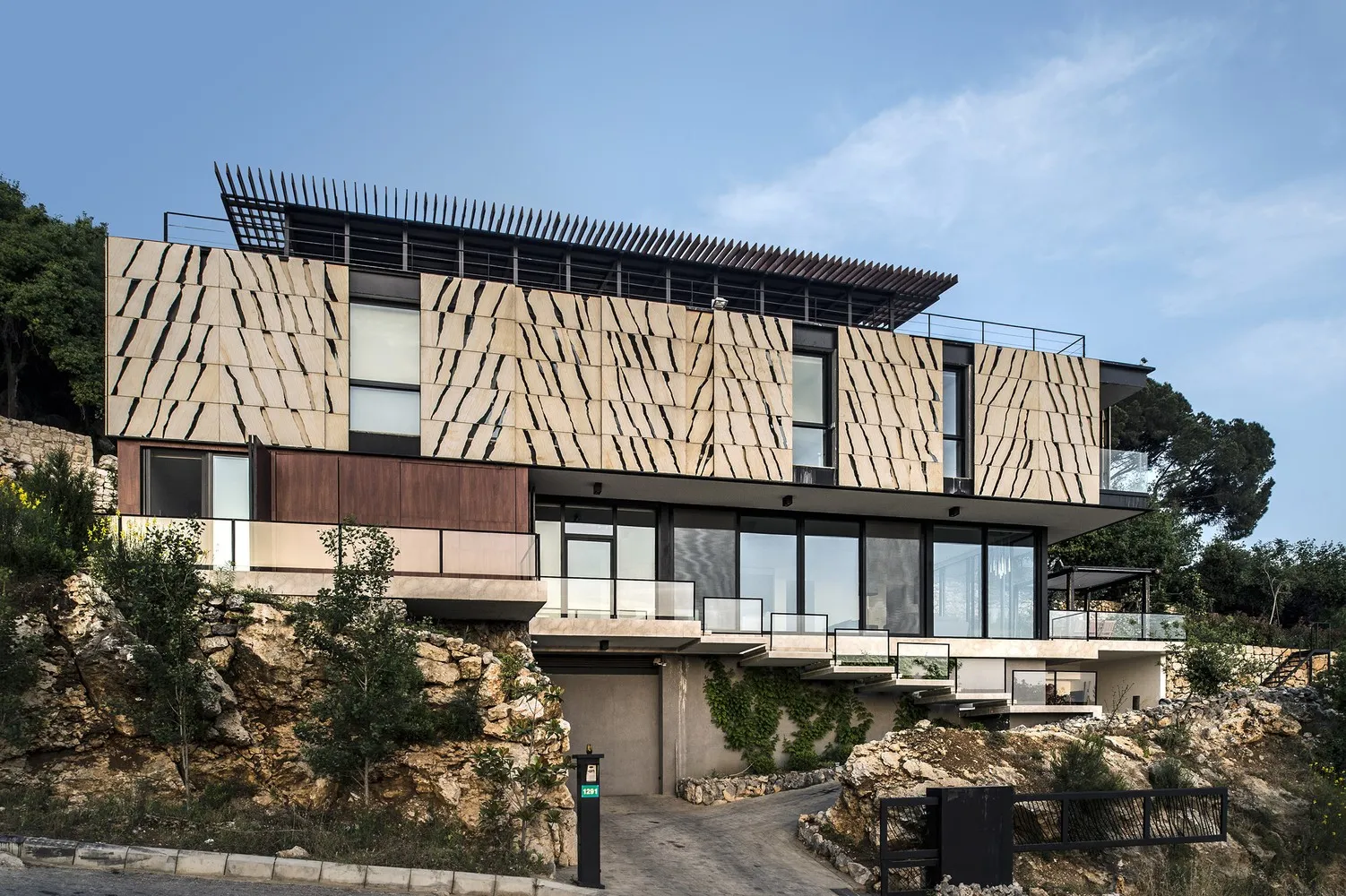 House Tahan by Blankpage Architects: Floating Stone Garden Over Junayd Bay