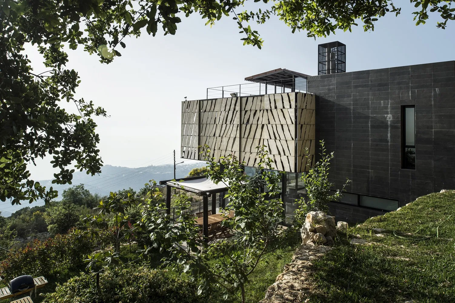 House Tahan by Blankpage Architects: Floating Stone Garden Over Junayd Bay