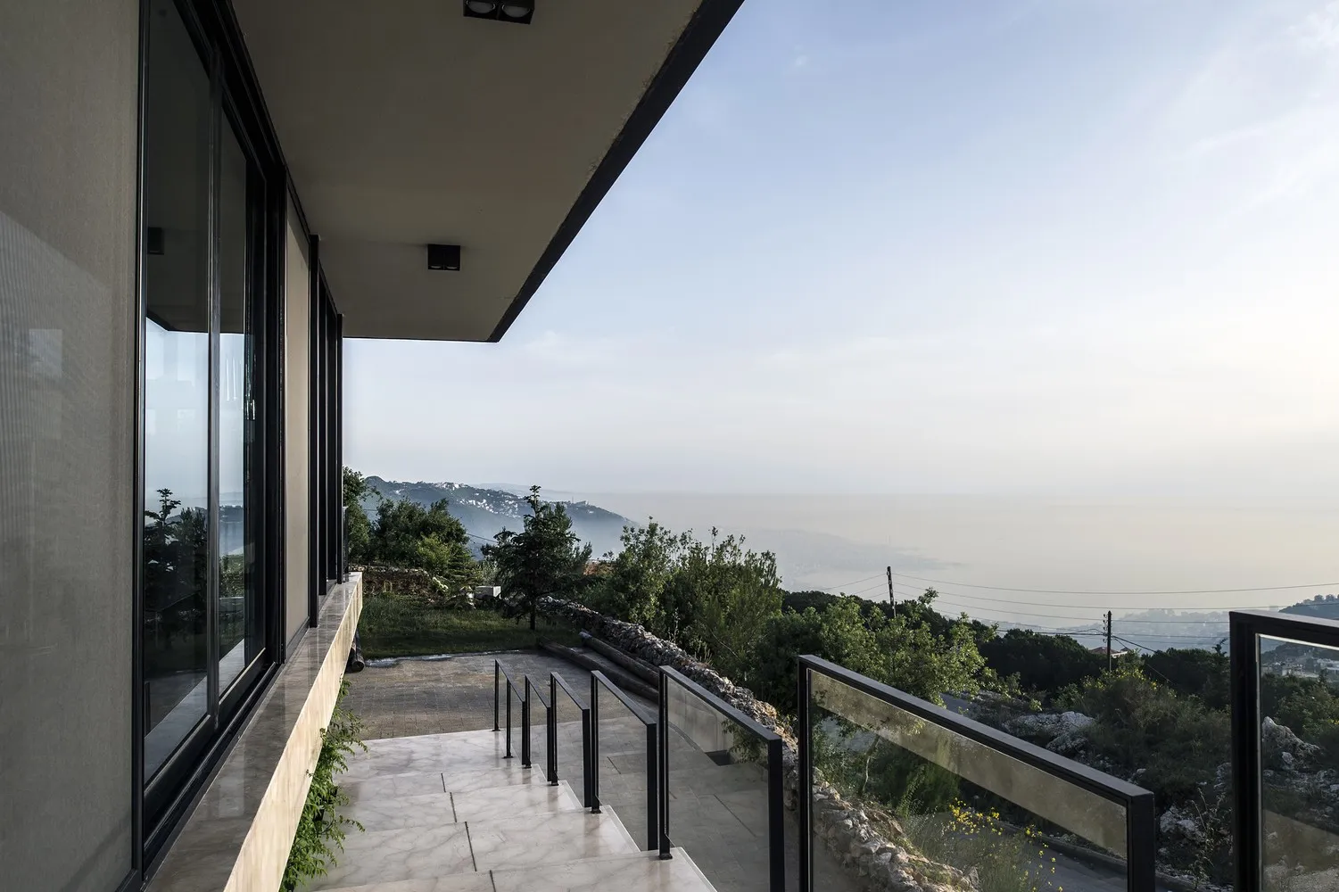 House Tahan by Blankpage Architects: Floating Stone Garden Over Junayd Bay