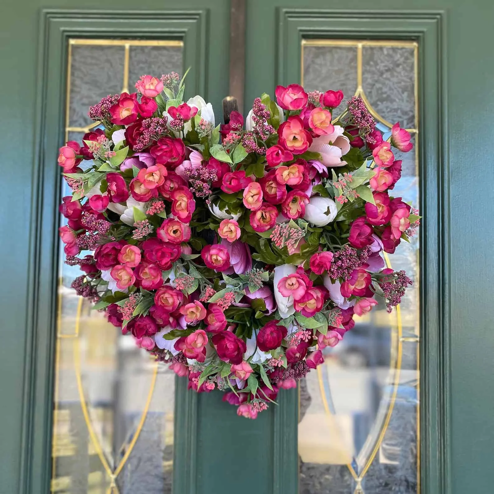 15. Kranz mit Blüten in Form eines Herzens