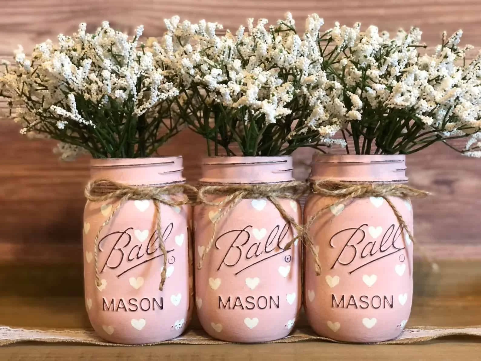 14. Pink Mason Jar Heart Centerpiece