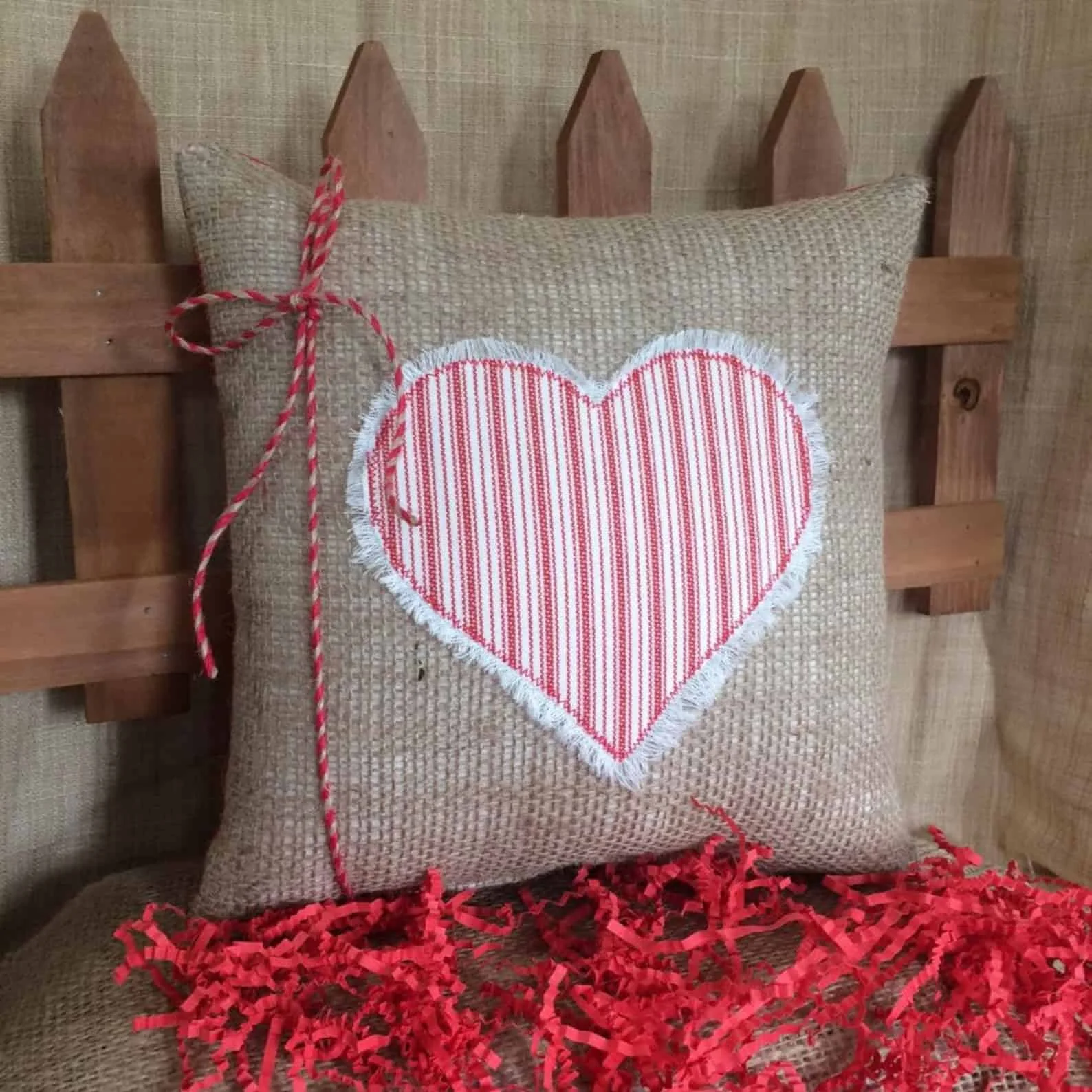 10. Red Heart Plaid Pillow