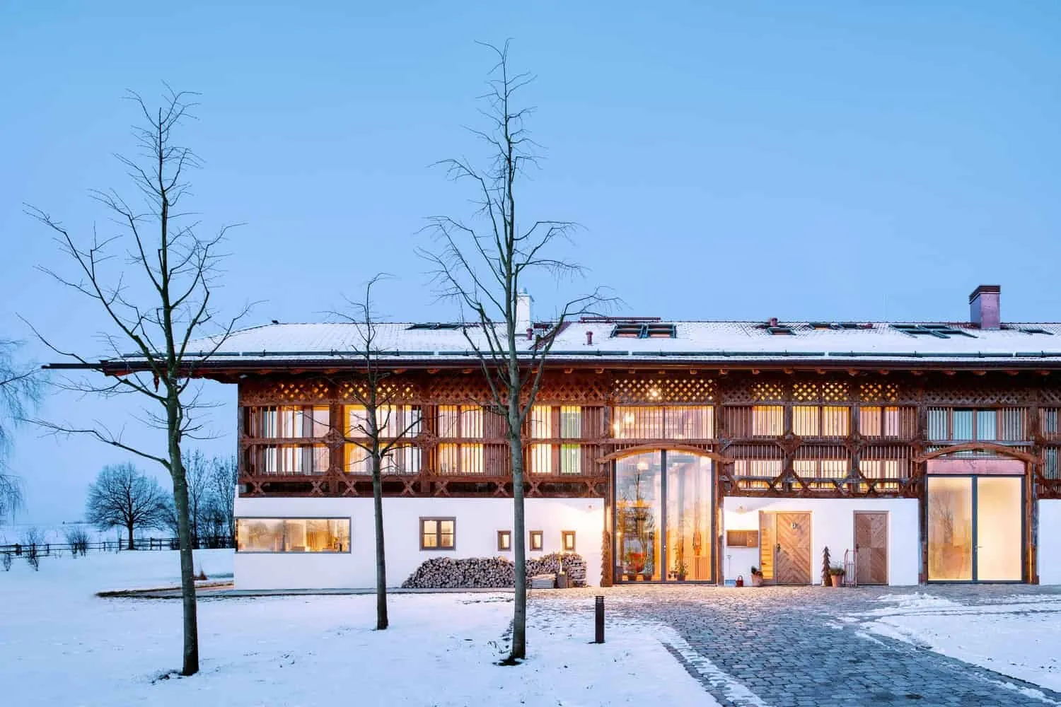 Wooden Truss Barn House and Meeting Space by Leupold Brown Goldbach Architekten