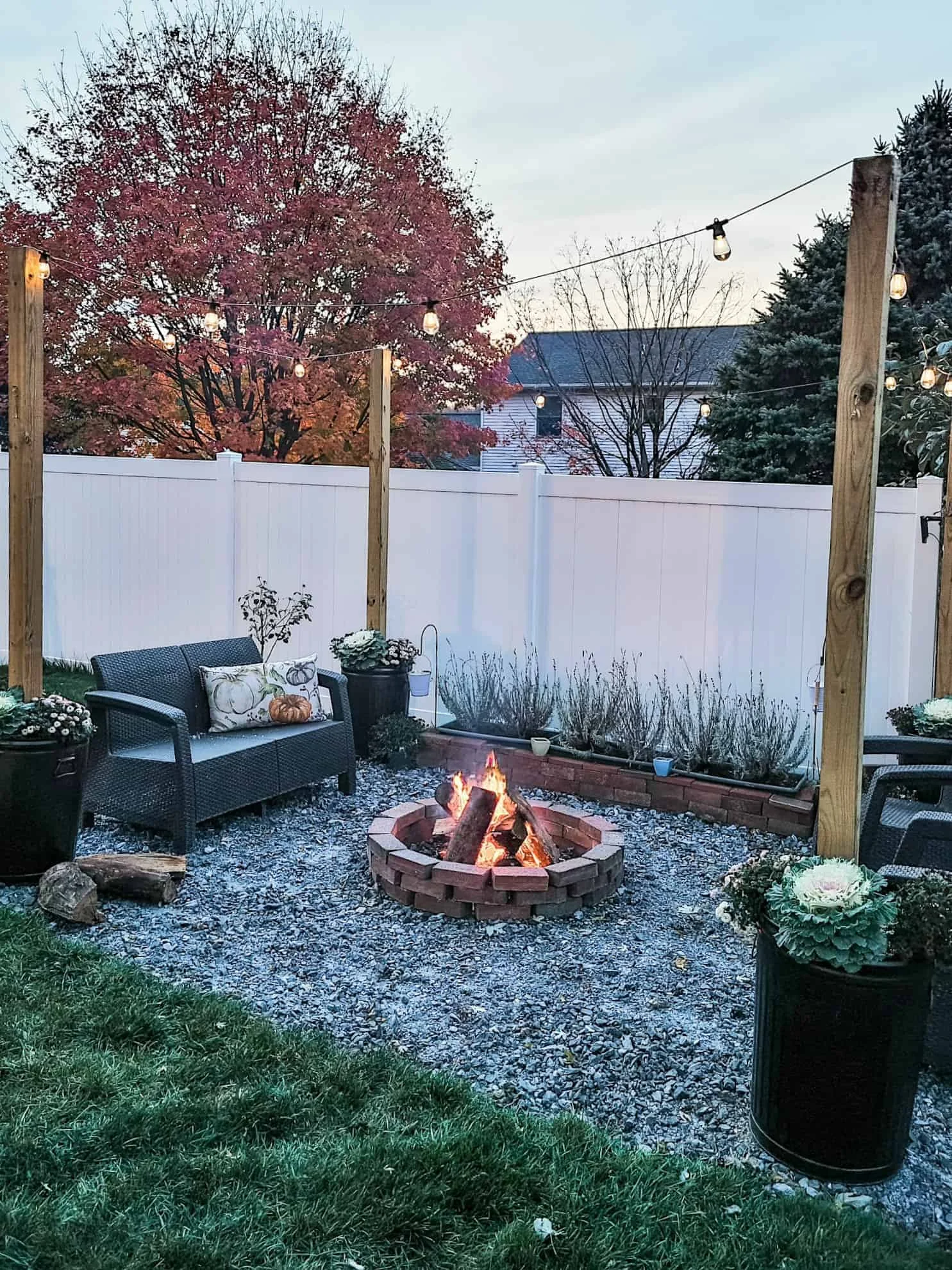 12. Build a DIY Backyard Fireplace from Leftover Bricks