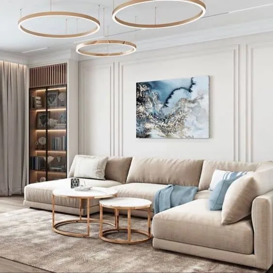 Tables and Pictures for a Bright Living Room