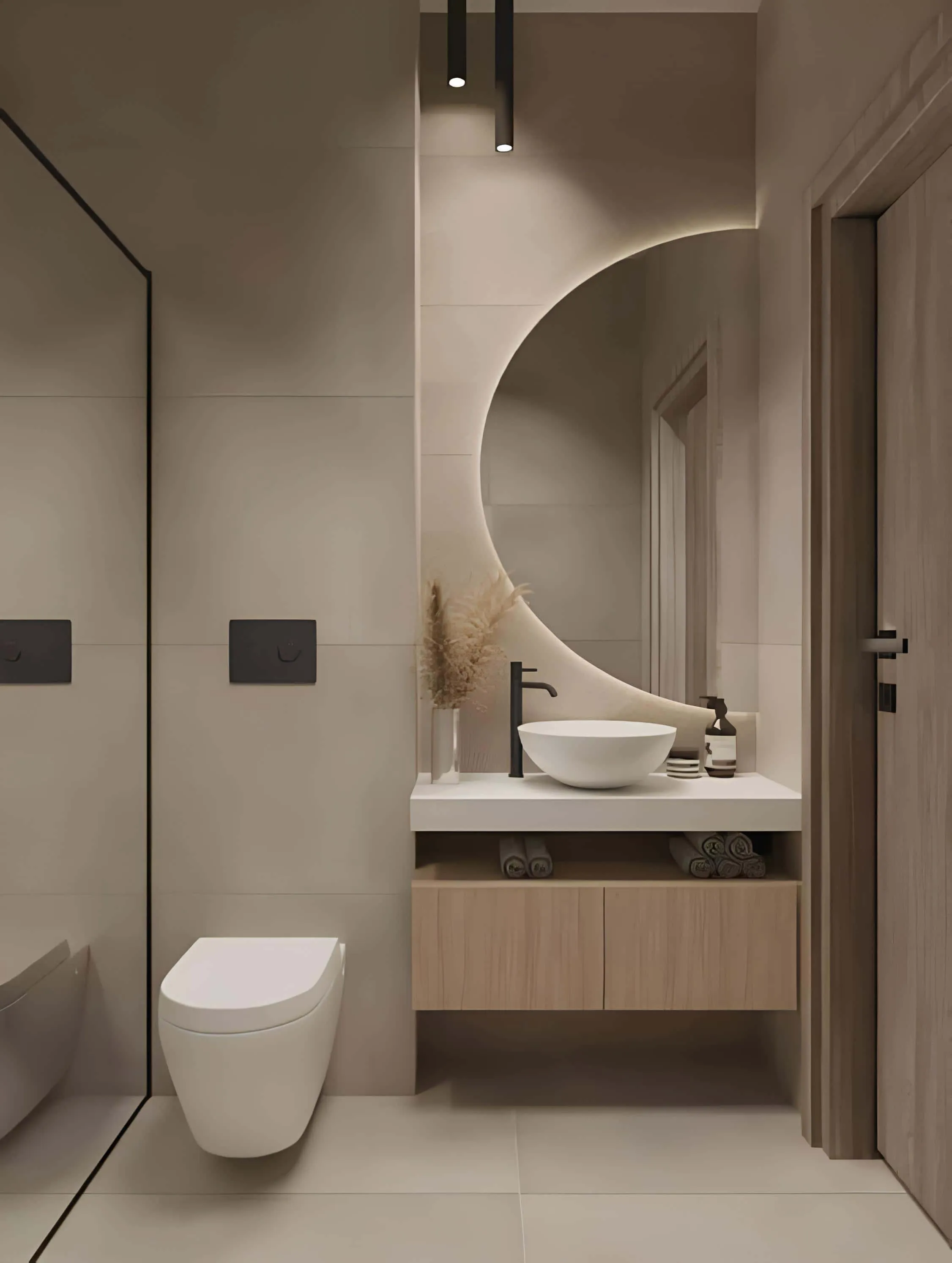 Minimalist bathroom design with curved mirror, wall-mounted toilet and soft lighting.