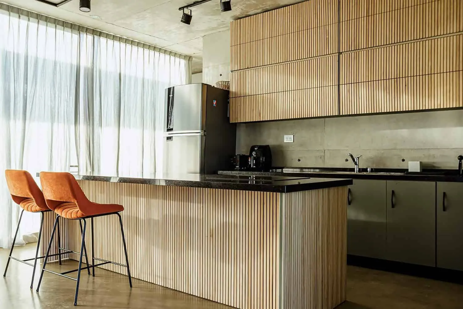 TIM Arquitectos设计的孟买之家：几何优雅的钢筋混凝土住宅