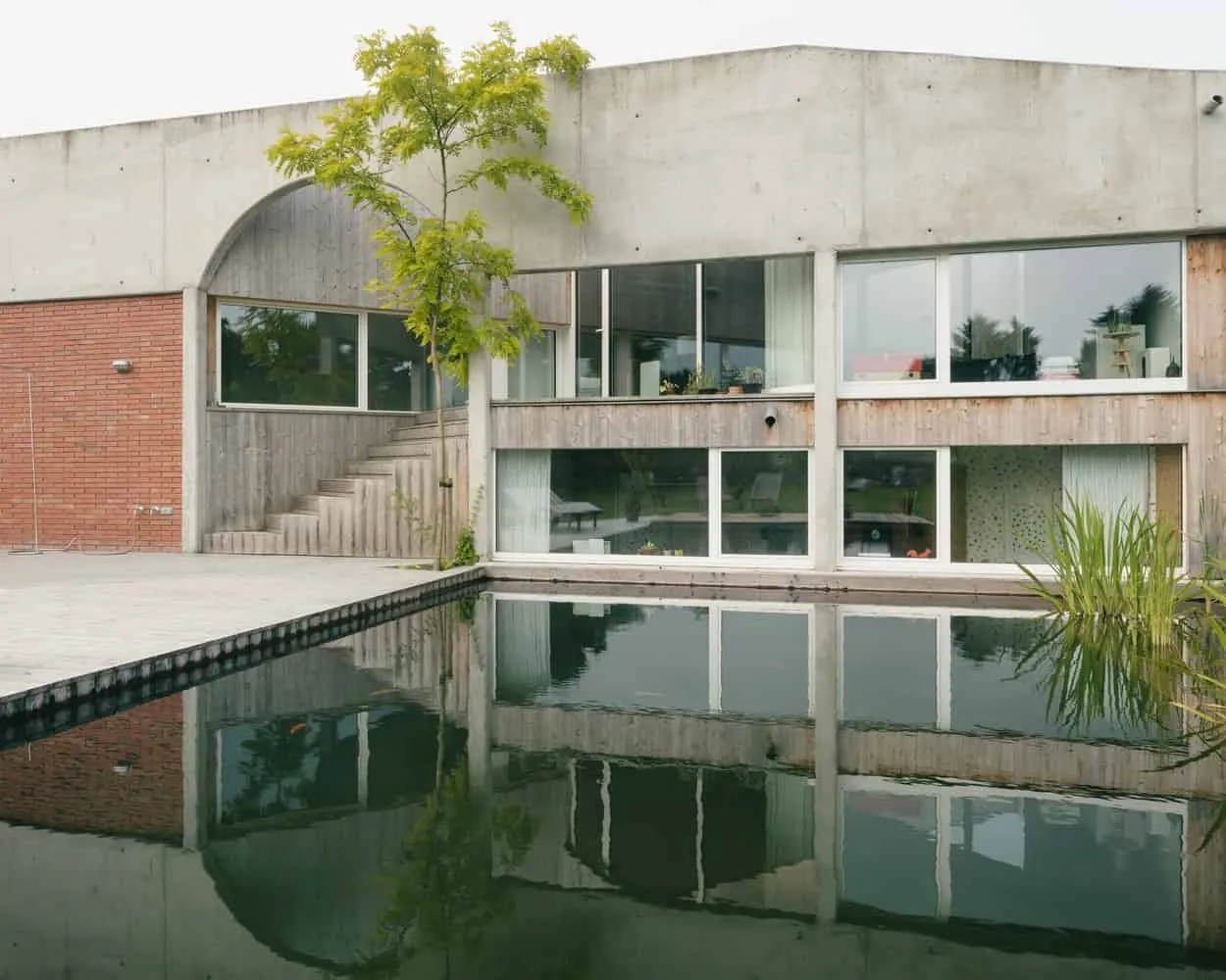 BLAF Architecten设计的hkZ住宅：泽尔勒的混凝土网格可持续住房