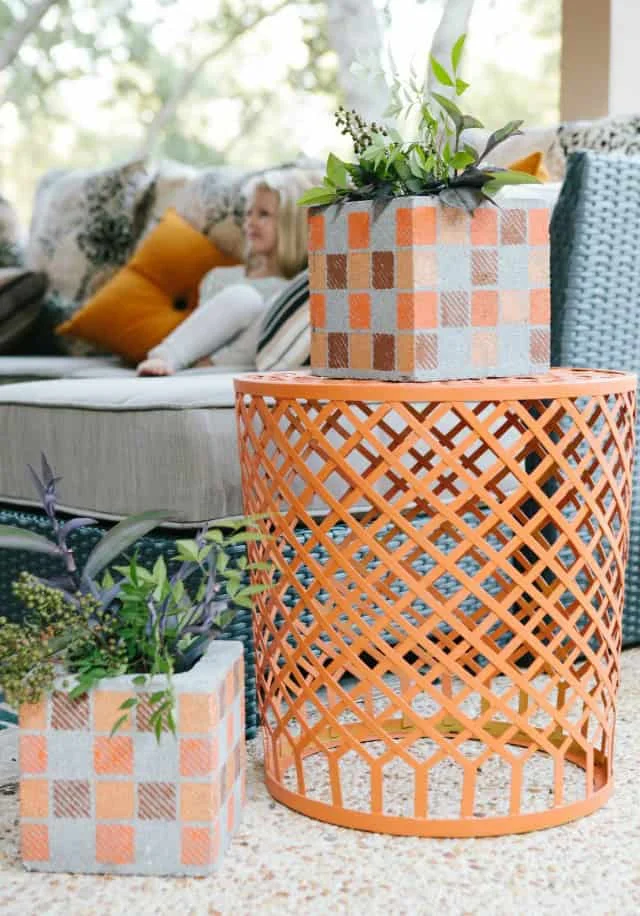 14. DIY Painted Brick Planters