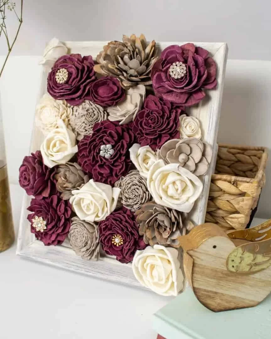 11. Flores de madera enmarcadas