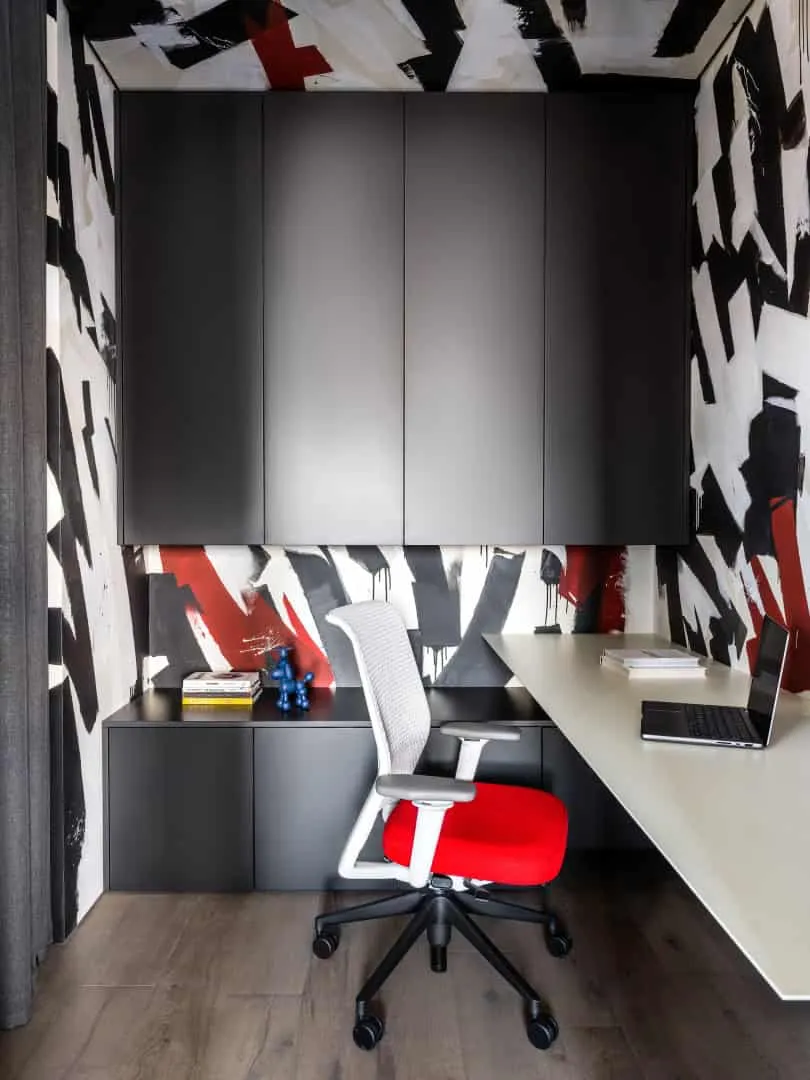 TV wall with vertical panels and reflected daylight