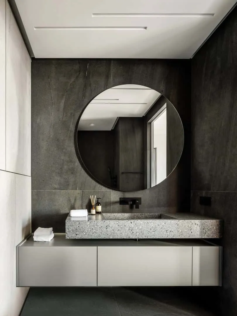 Integrated sideboard with hidden drawers and soft lighting