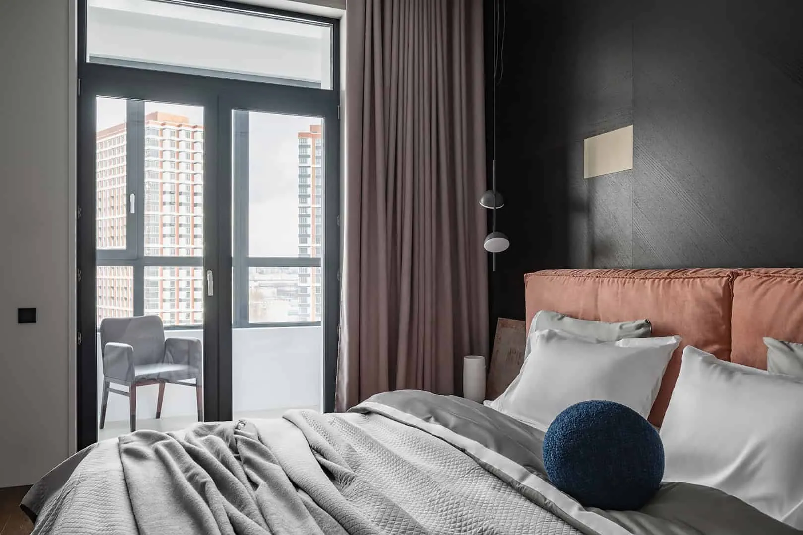 Living room with bronze mirror accents and calm neutral tones