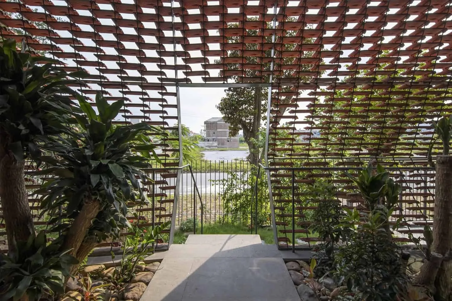 Nest House by H&P Architects in Fu Lu, Vietnam