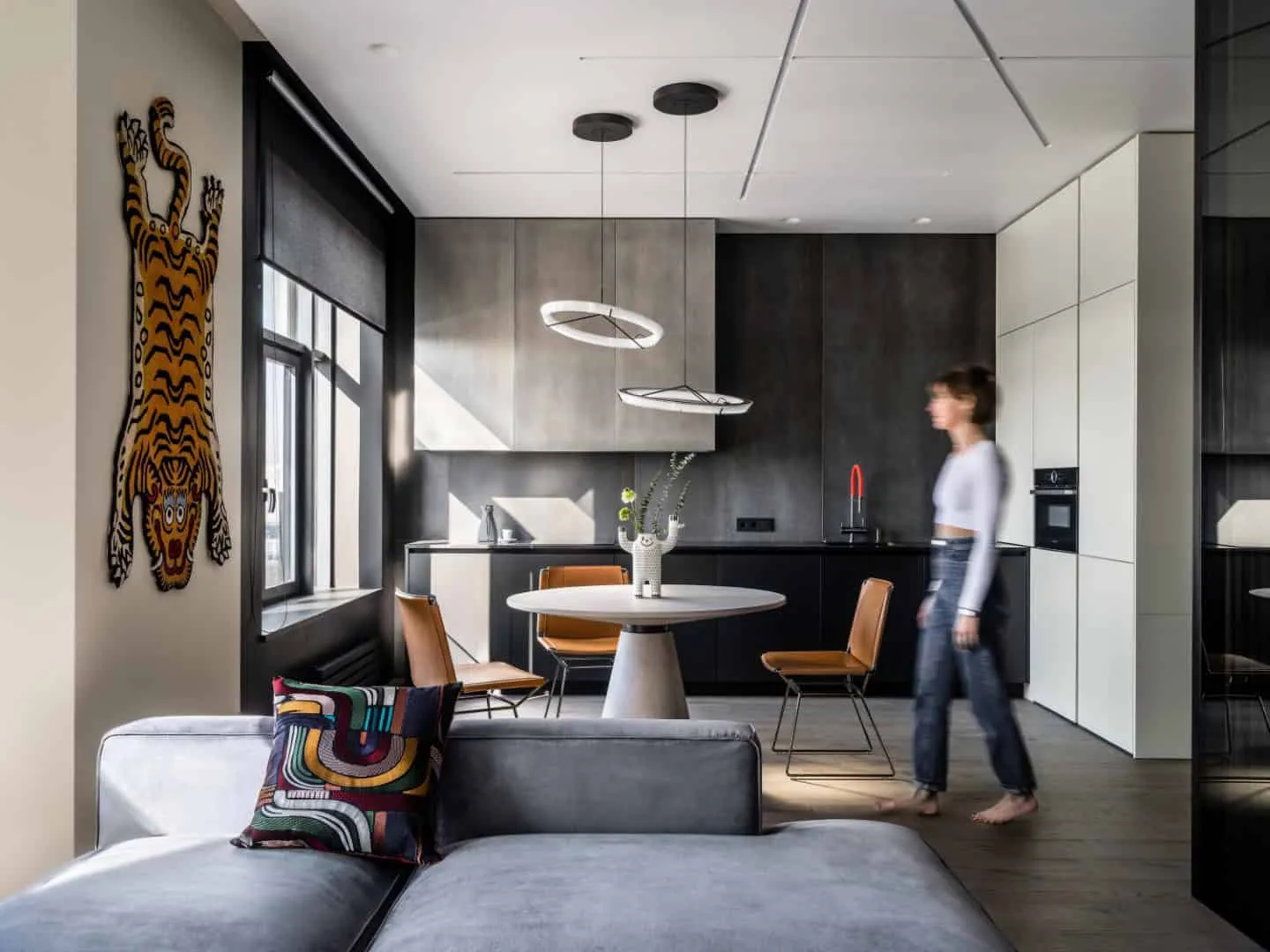 Living room composition with soft forms and dark accents