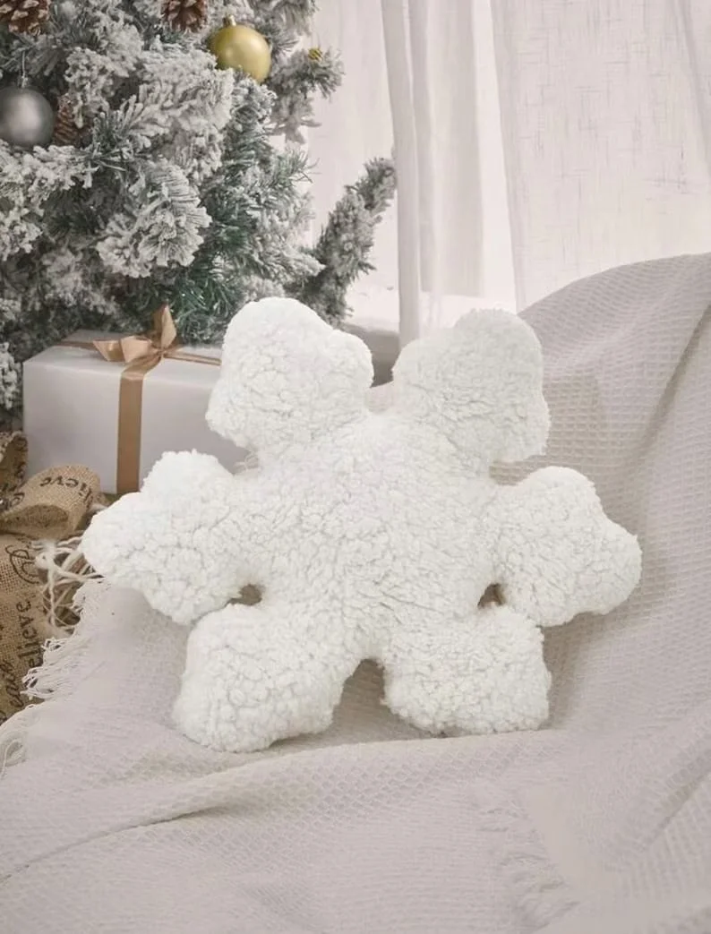4. Almohada con copo de nieve
