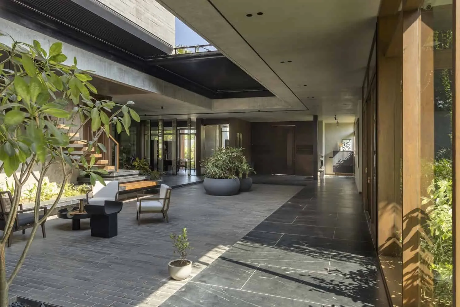 Courtyard House by MODO Designs: Modern Haveli with Open Courtyards in Rancharda