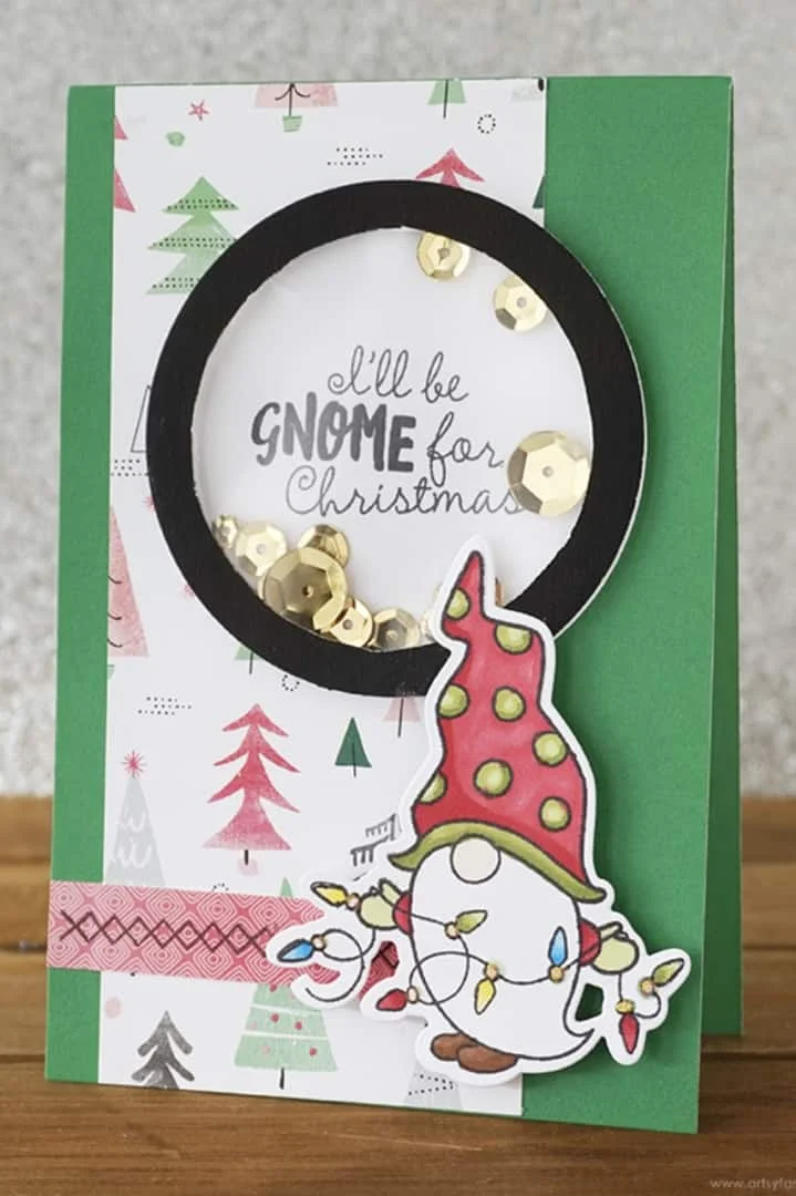 4. Tarjeta mezcladora con un duende navideño
