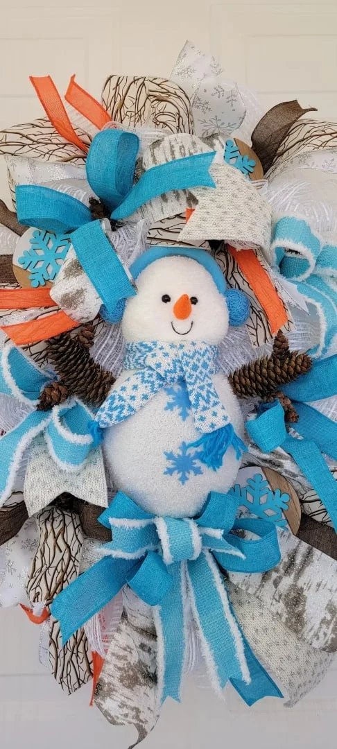 15. Decoración de muñeco de nieve