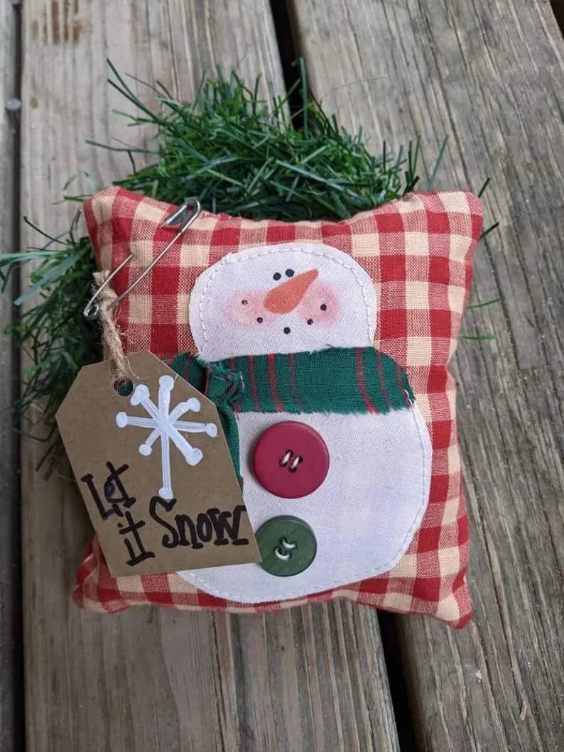 13. Almohada de muñeco de nieve