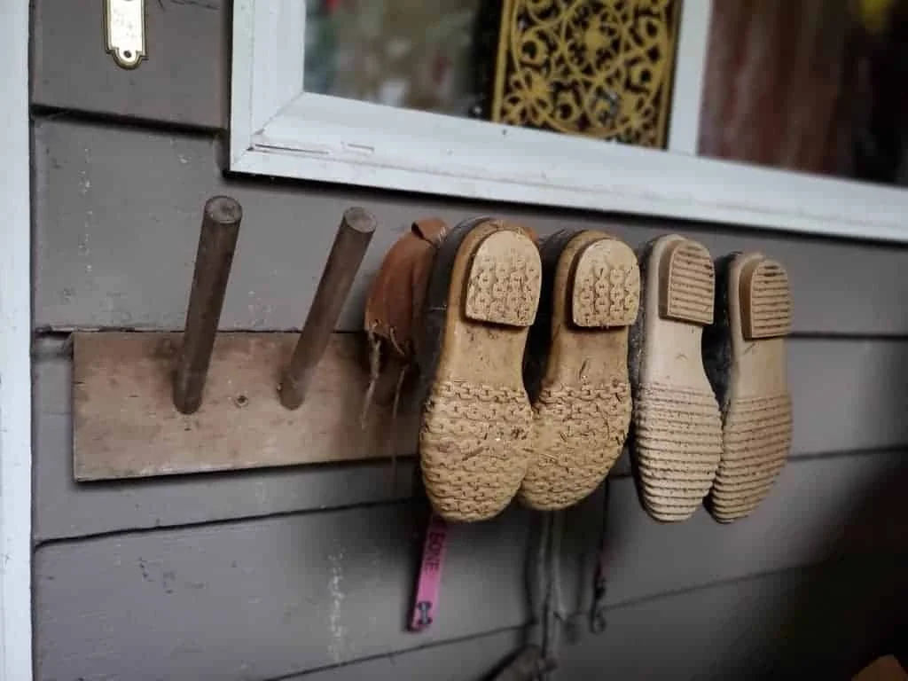 15. DIY Hanging Porch Boot Rack