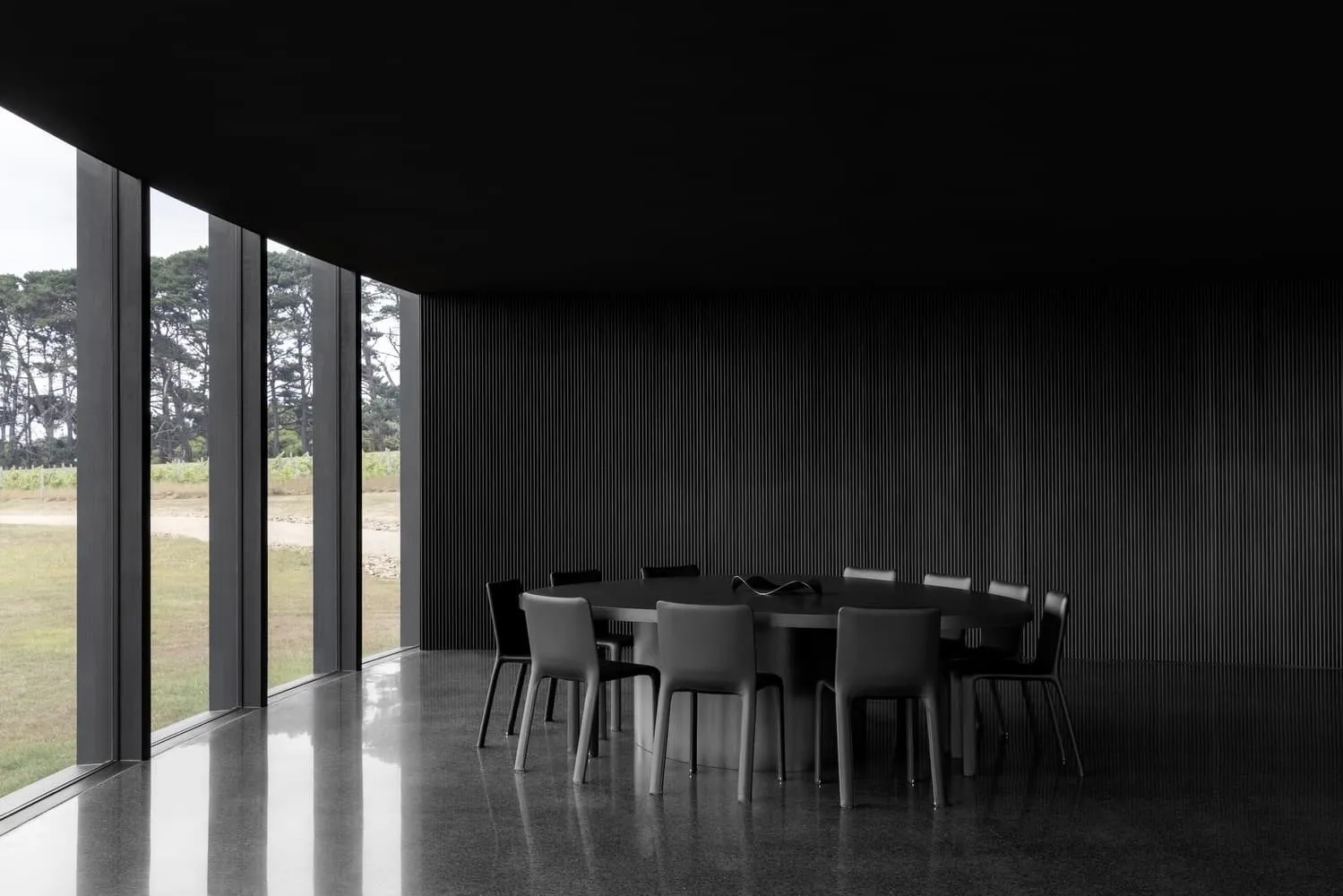 Night view of coastal refuge glowing from within