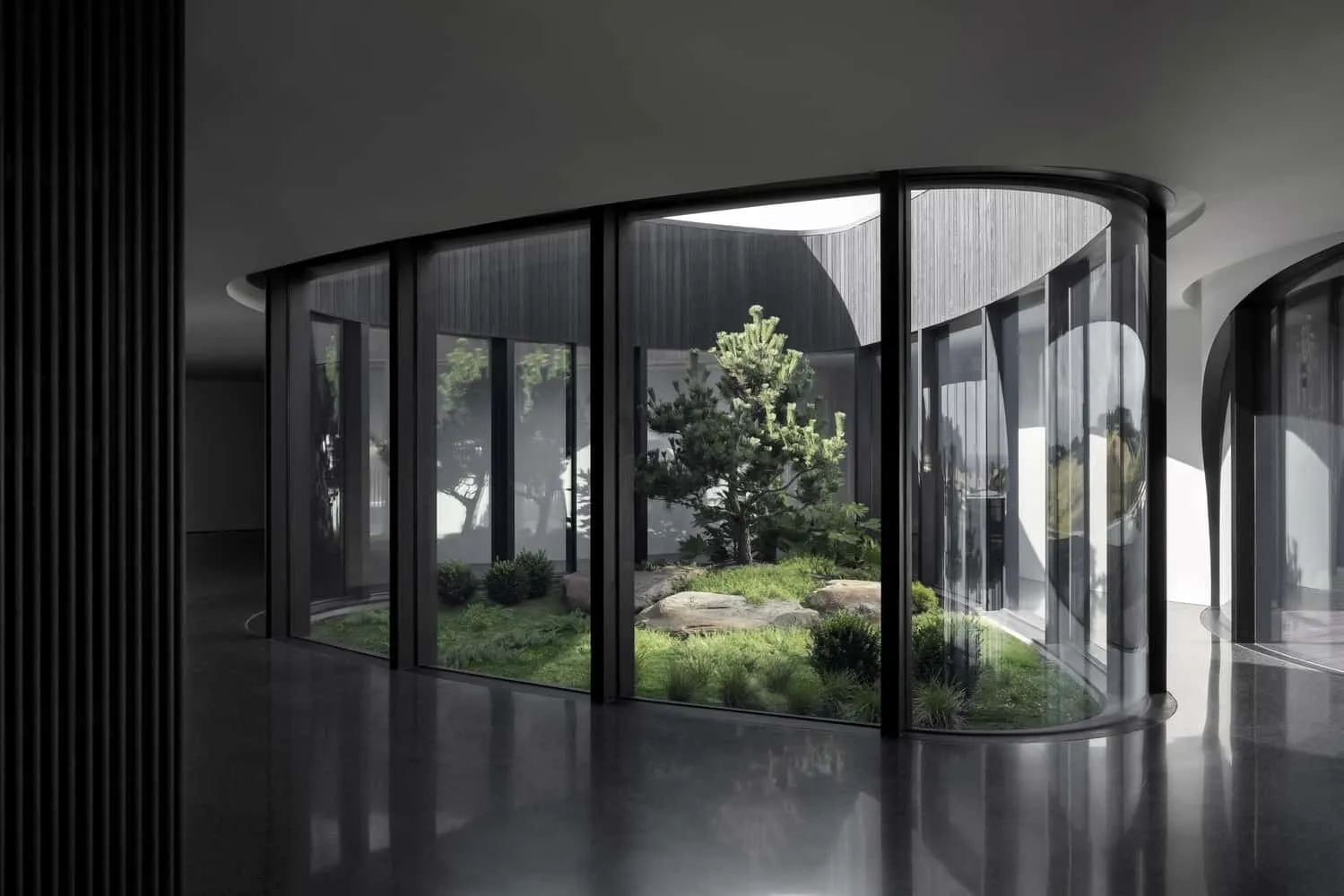 Long corridor with gradients of light on textured walls