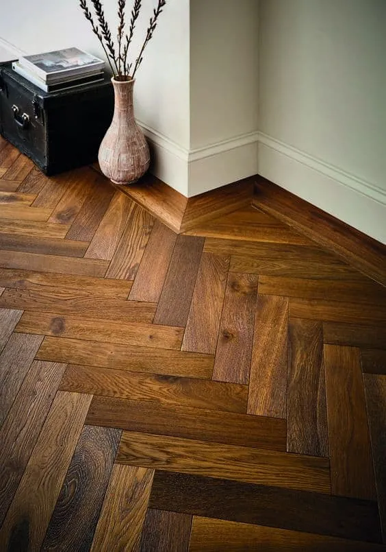 Green Smoked Oak Parquet Floors in Herringbone Style Add Elegance to Your Dining Room