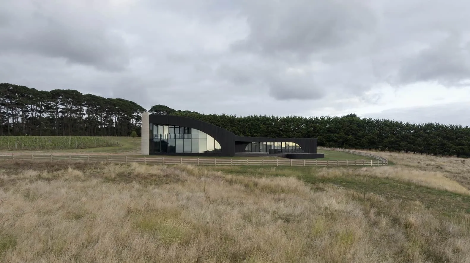 Final exterior shot of sculptural coastal house