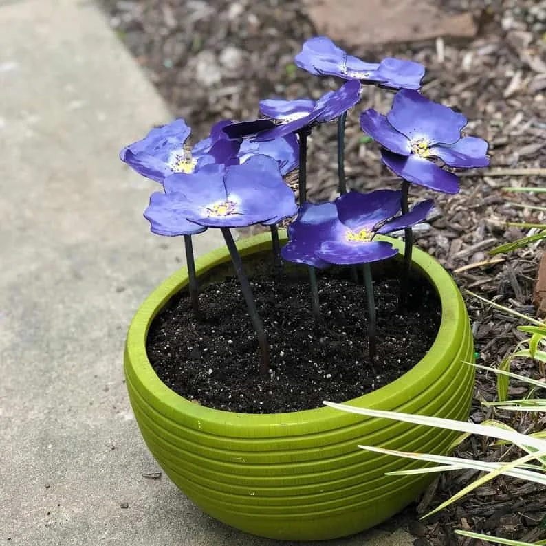 7. Flores metálicas artificiales de violets