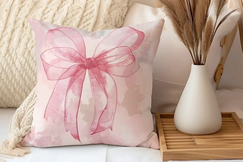 2. Almohada rosa con cinta