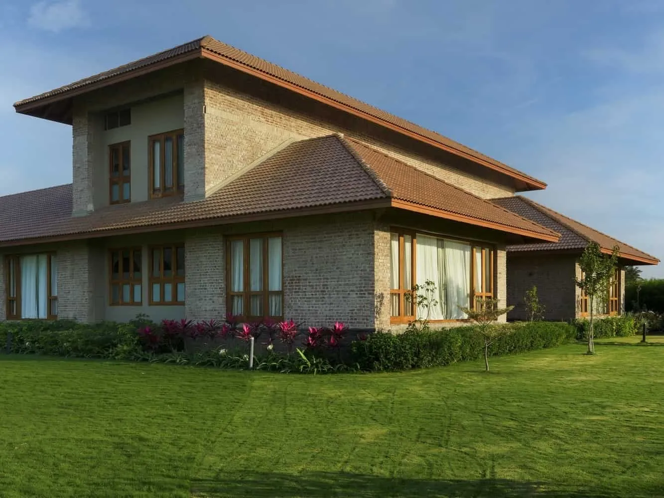 Interior view with arched light illuminating textured brick and plaster surfaces.