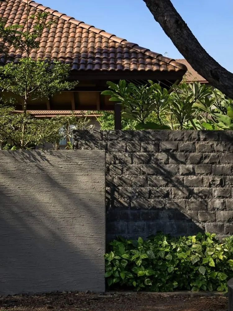 Close-up of stone masonry, brick infill and wooden ceilings showing layered textures.