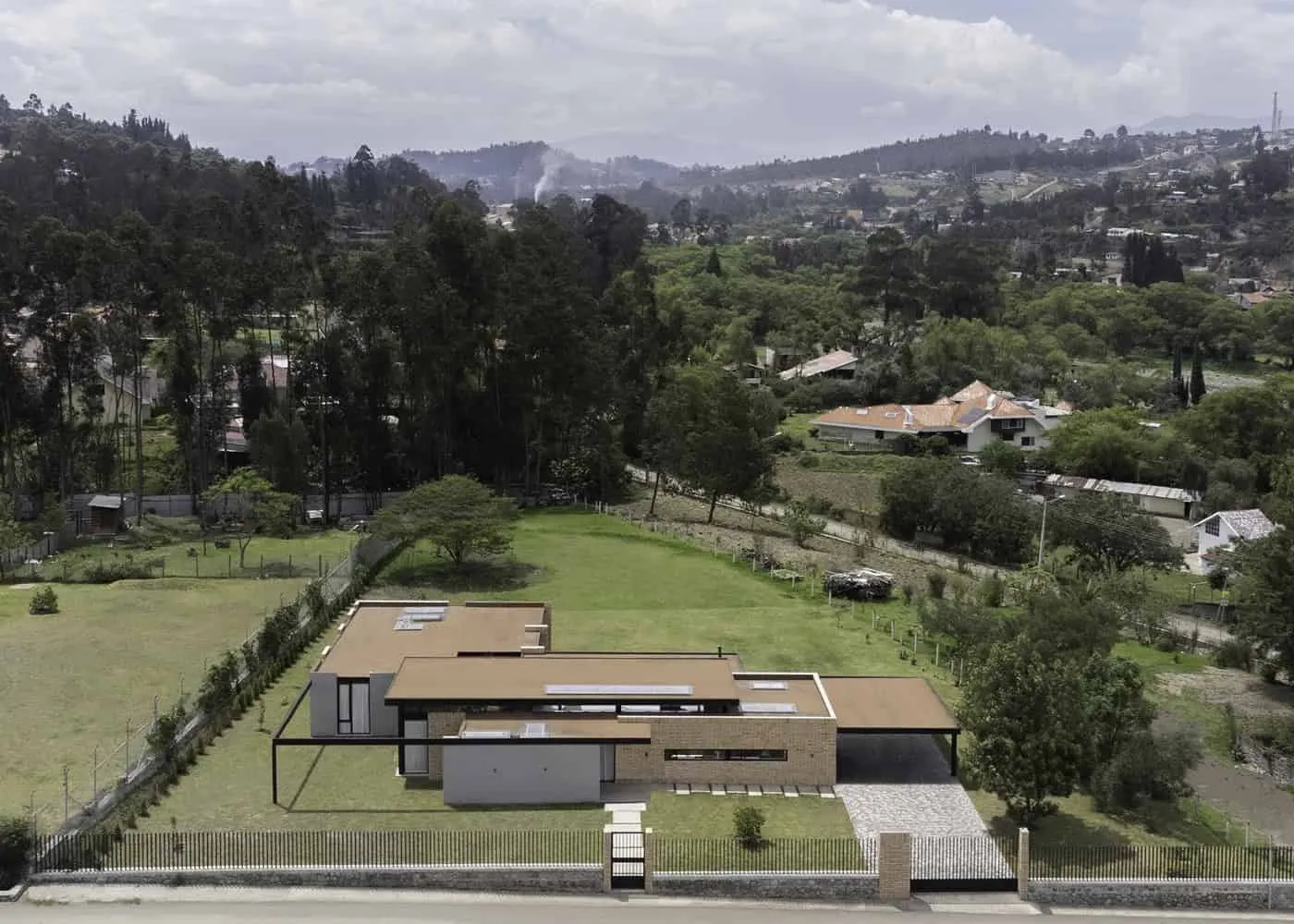 TC House in Cuenca by Arqcor — Modern Brick Residence