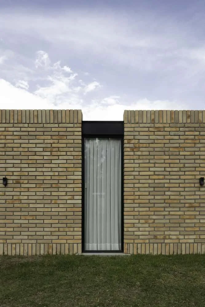 TC House in Cuenca by Arqcor — Modern Brick Residence