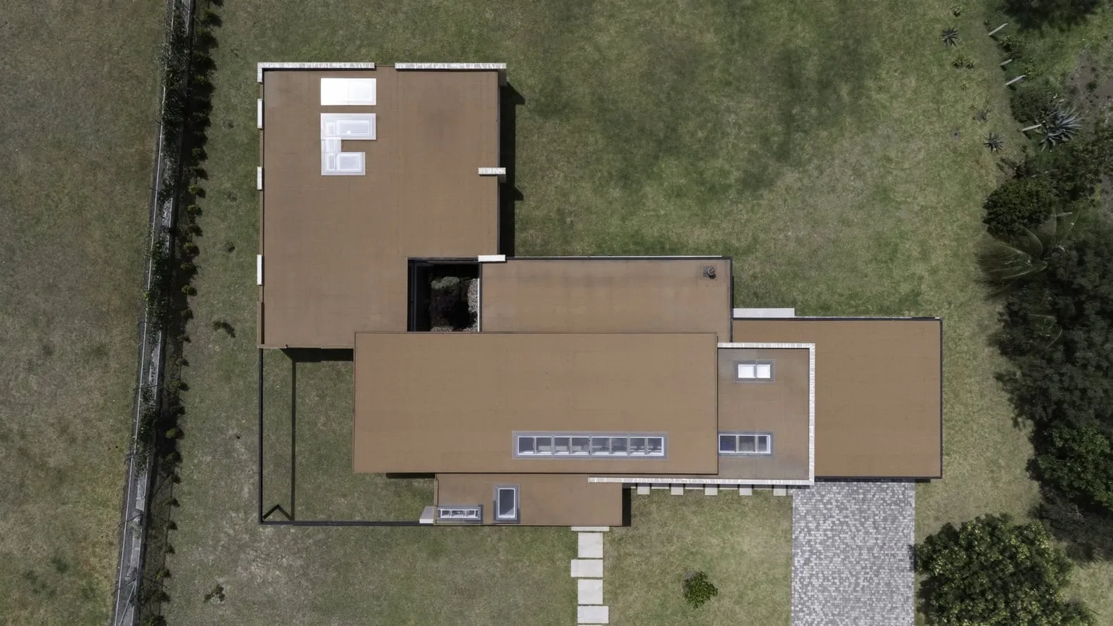 TC House in Cuenca by Arqcor — Modern Brick Residence