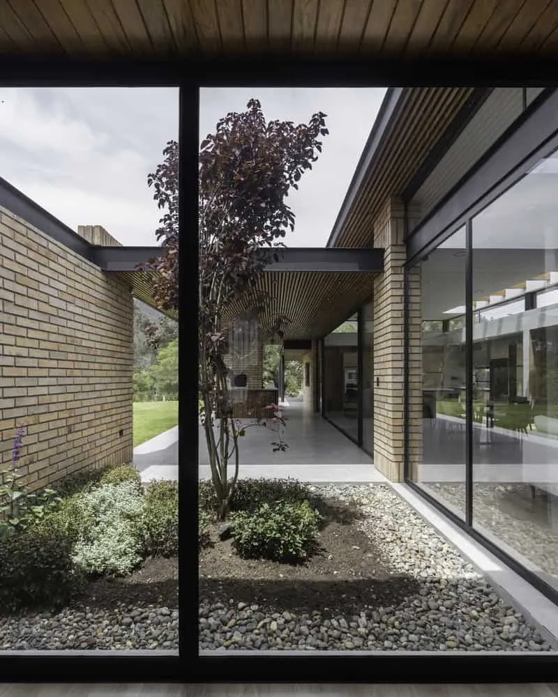 TC House in Cuenca by Arqcor — Modern Brick Residence