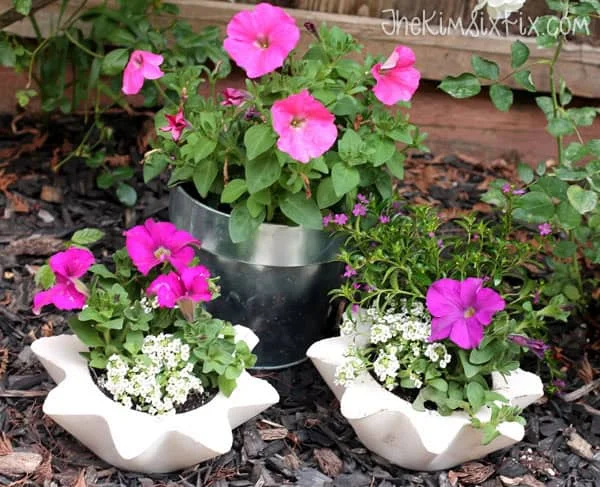 11. Macetas de concreto con tallado