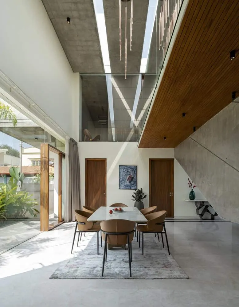 Stone House: Harmonious Blend of Nature and Modern Design by Crest Architects