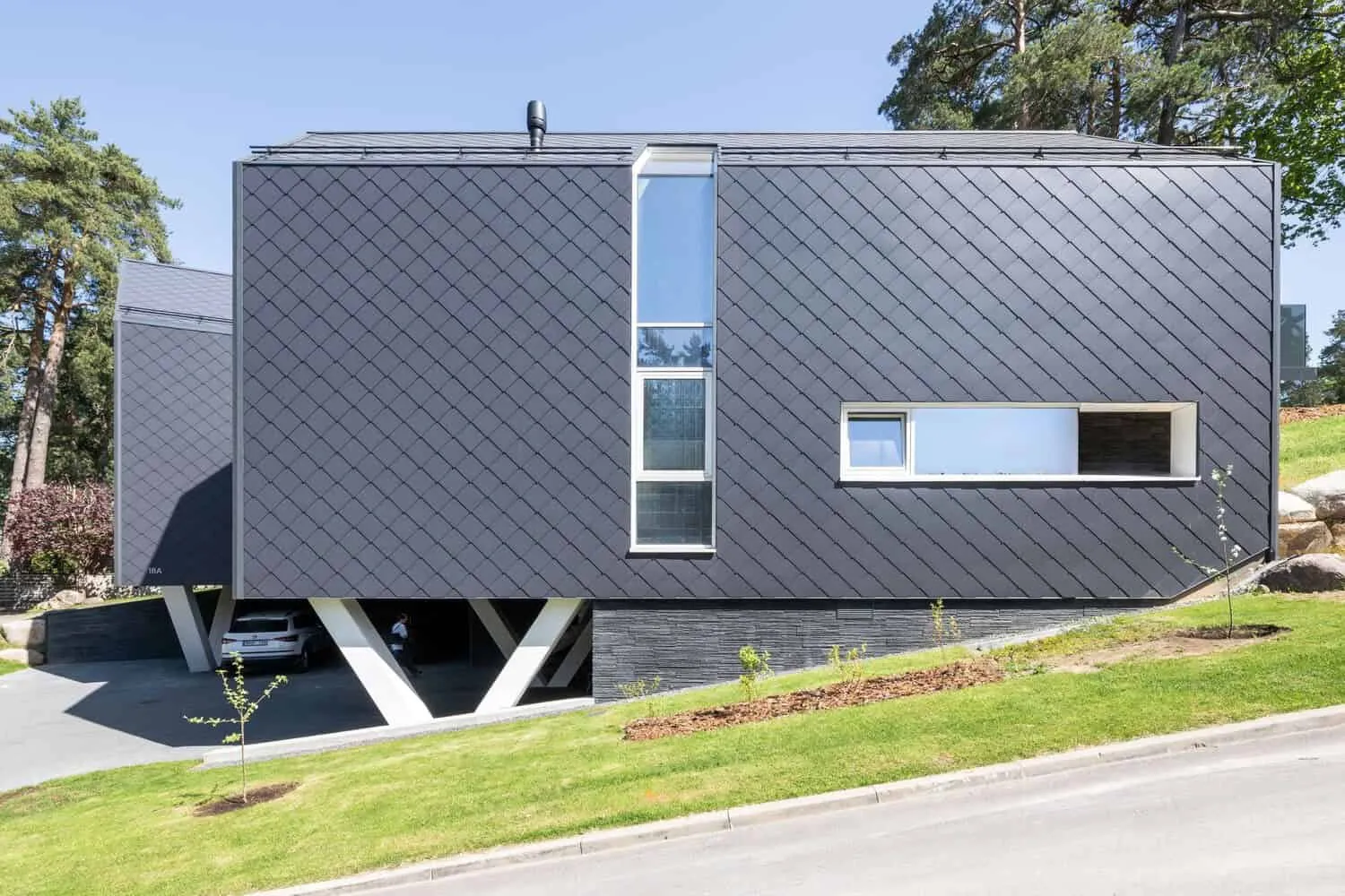 Two-Story House by ArchLAB Studio: Cozy Retreat Amidst Pine Forests in Vilnius