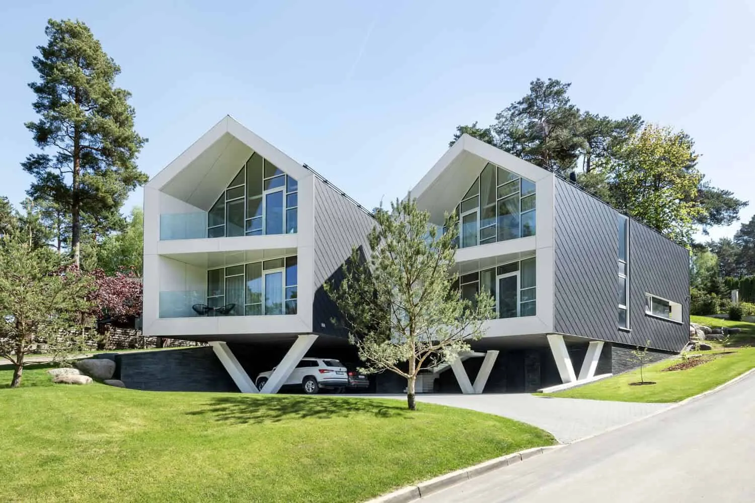 Two-Story House by ArchLAB Studio: Cozy Retreat Amidst Pine Forests in Vilnius