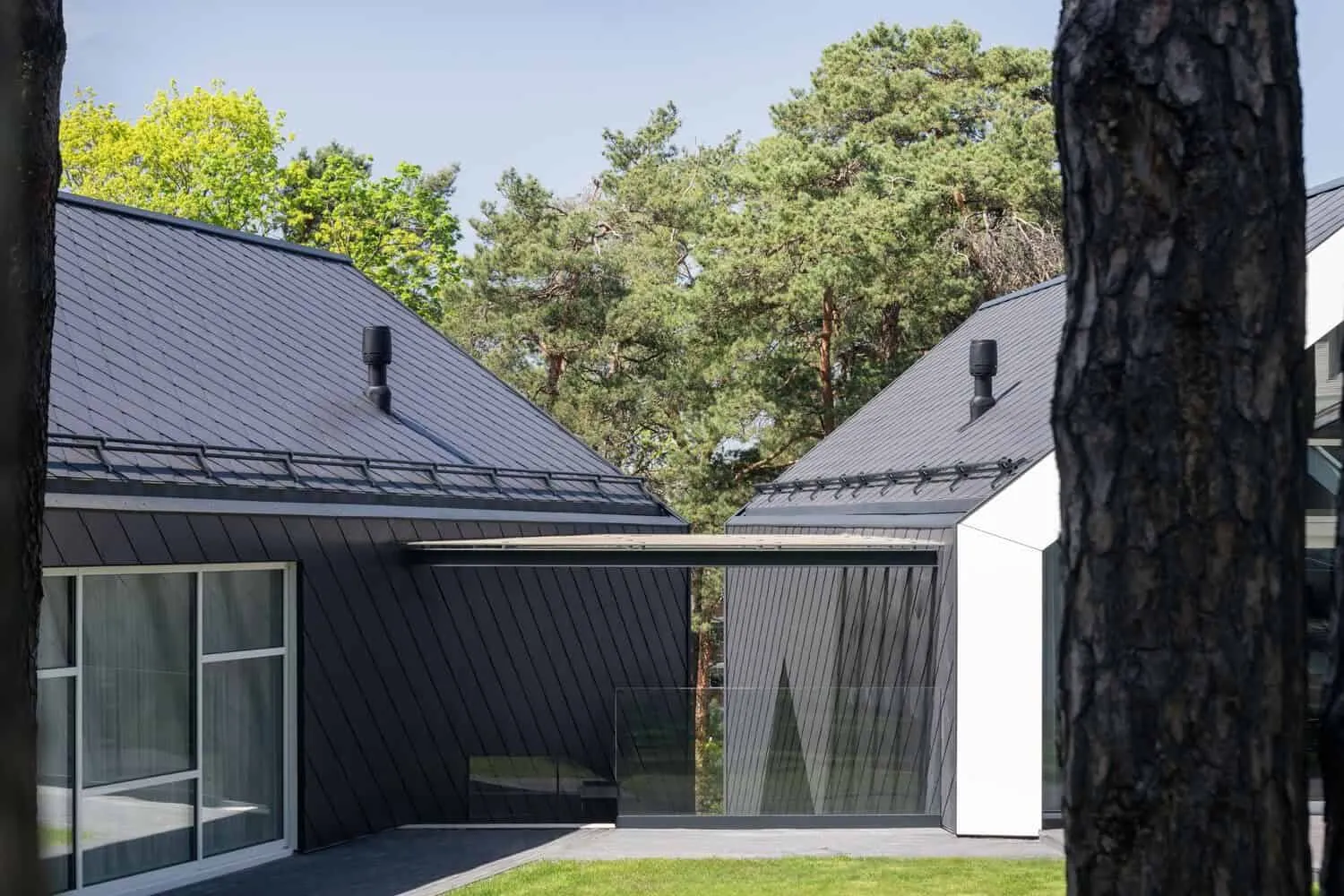 Two-Story House by ArchLAB Studio: Cozy Retreat Amidst Pine Forests in Vilnius