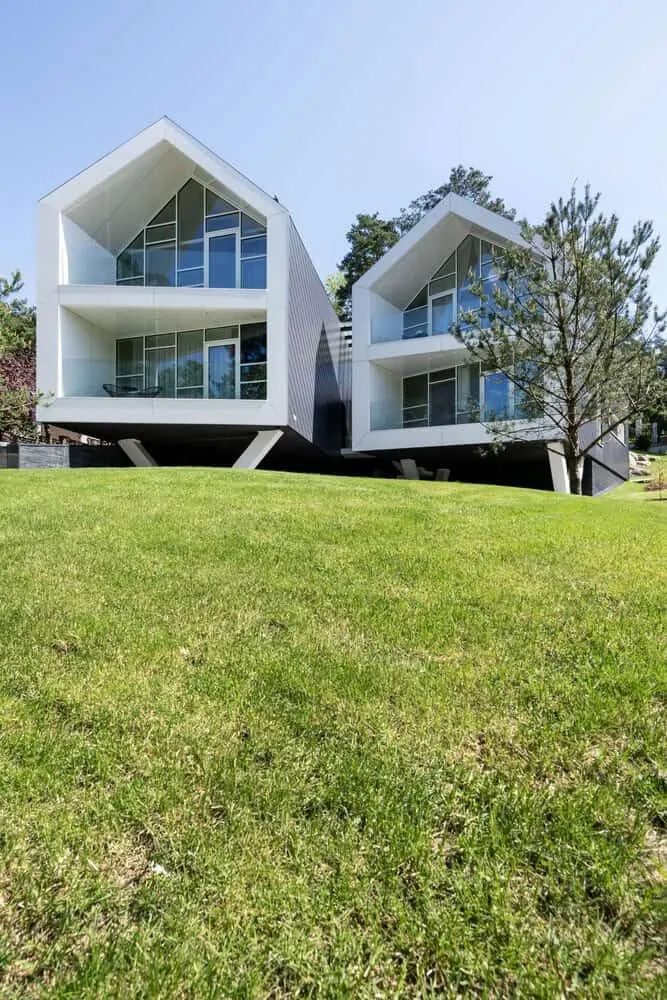 Two-Story House by ArchLAB Studio: Cozy Retreat Amidst Pine Forests in Vilnius