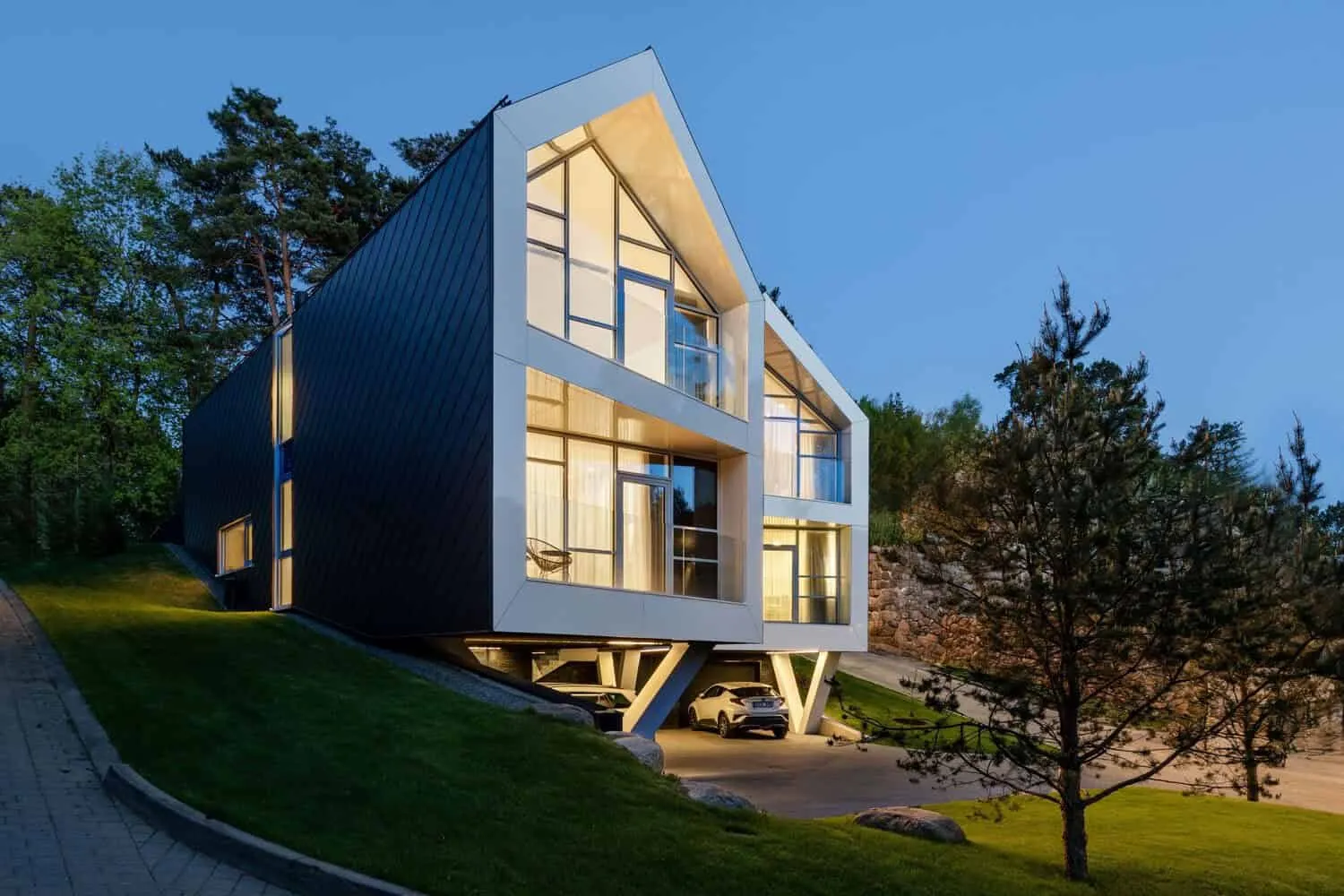 Two-Story House by ArchLAB Studio: Cozy Retreat Amidst Pine Forests in Vilnius