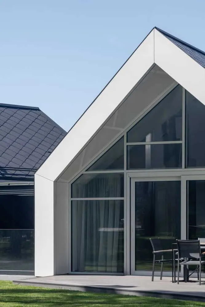 Two-Story House by ArchLAB Studio: Cozy Retreat Amidst Pine Forests in Vilnius